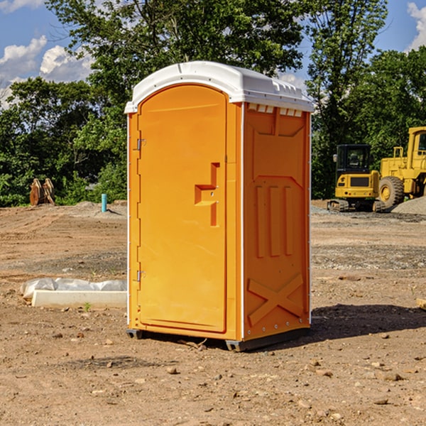 how often are the portable restrooms cleaned and serviced during a rental period in Yale